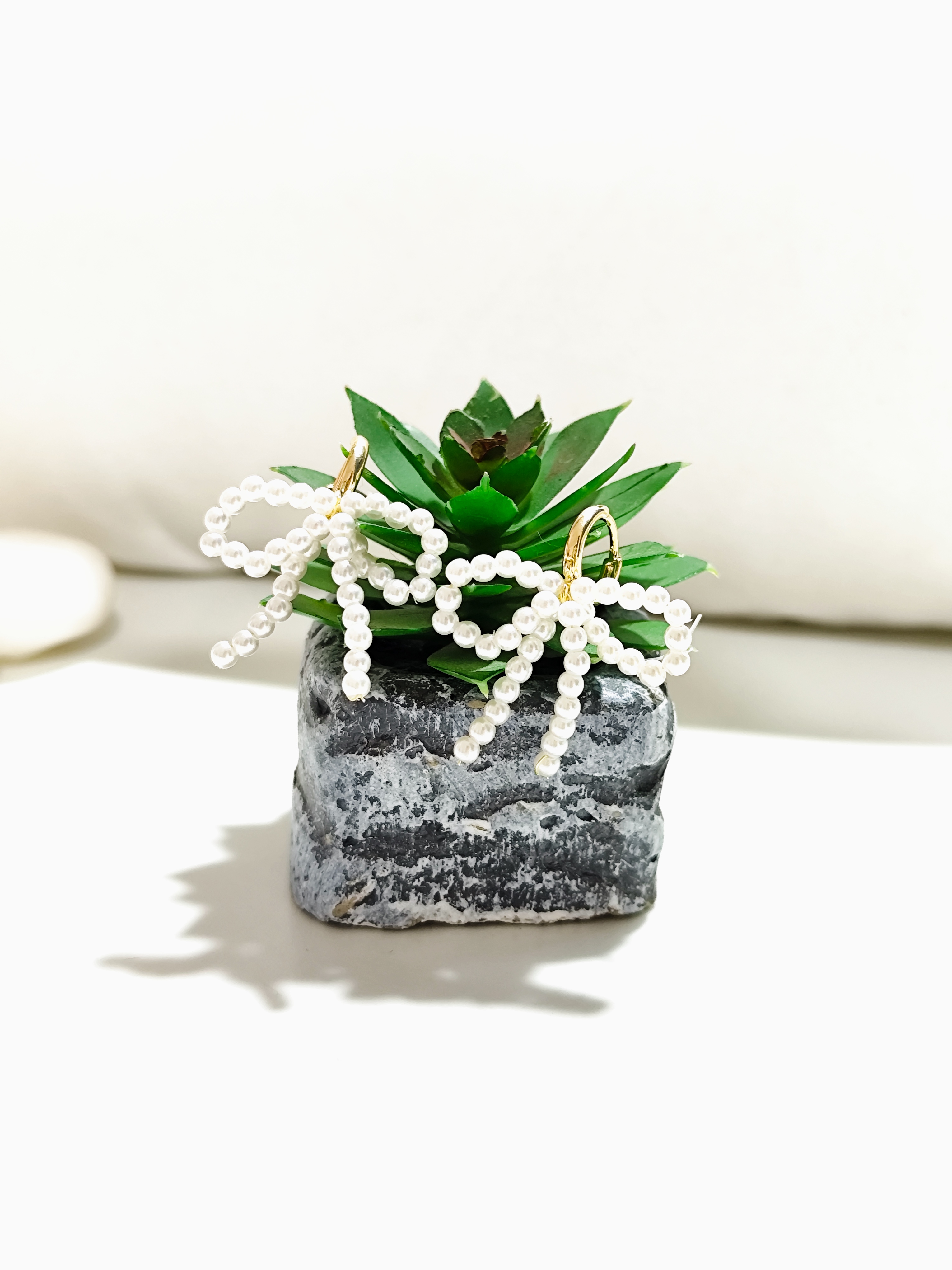 Delicate pearls shaped into designs that feel effortlessly chic.